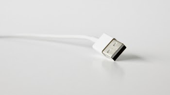 Close-Up Photo of White Usb Cable