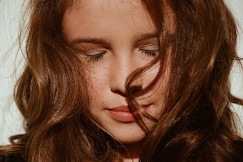 Close-Up Photo of Woman's Face
