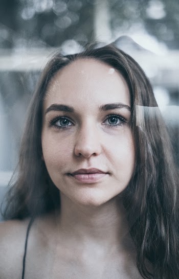 Close-up Photo of Woman's Face