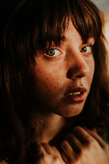 Close-Up Photo of Woman's Face