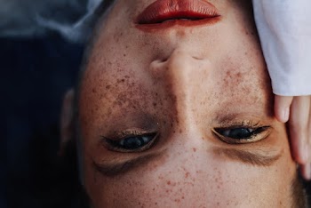 Close-Up Photo of Woman's Face