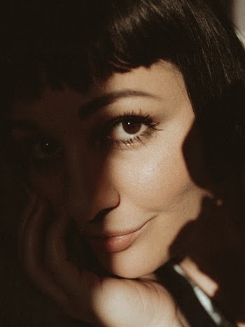 Close-Up Photo of Woman's Face