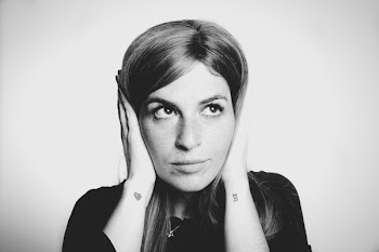 Close-up Photo of Woman Covering Her Ears