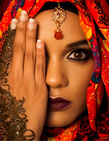Close-up Photo of Woman Covering Her Eyes With Her Right Hand