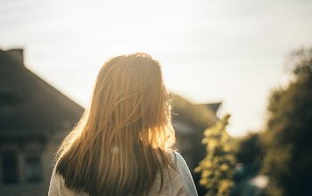 Close-Up Photo of Woman Facing Sideways