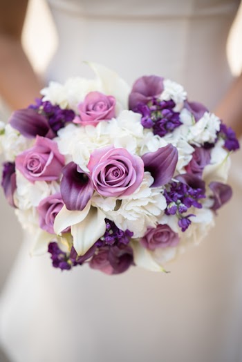 Close-Up Photo of Woman Holding Bouquet