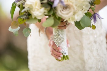 Close-Up Photo of Woman Holding Bouquet