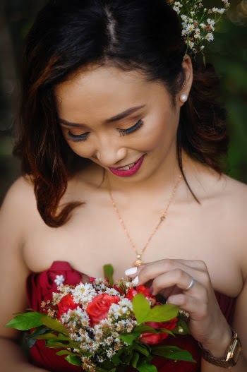 Close-Up Photo of Woman Holding Flowers