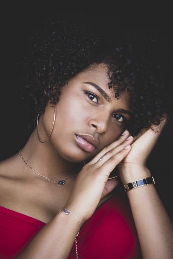 Close-up Photo of Woman in Red Top Posing