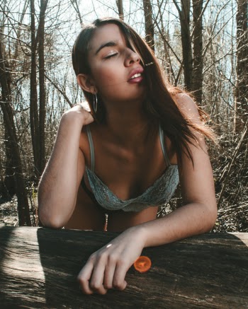 Close Up Photo of Woman in Teal Lace Brassiere