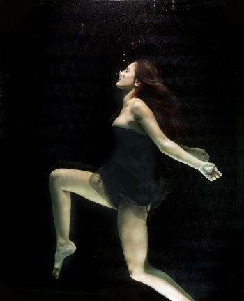 Close-up Photo of Woman in Underwater View