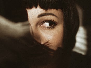 Close-Up Photo of Woman Looking Away