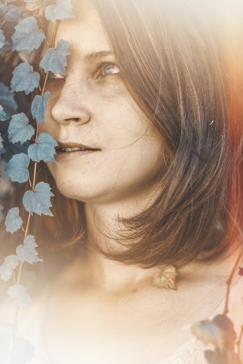 Close-up Photo of Woman Looking Away
