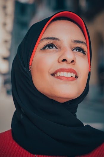 Close-Up Photo of Woman Looking Up
