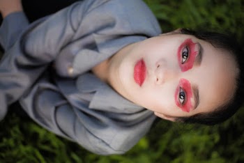 Close-up Photo of Woman Looking Up