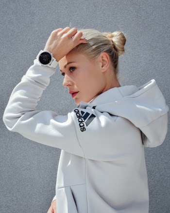 Close-Up Photo of Woman Wearing Adidas Jacket