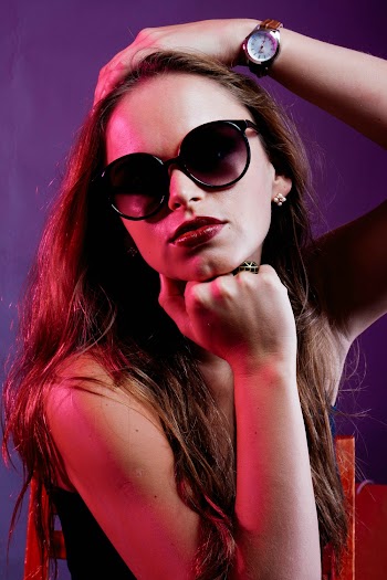 Close-Up Photo of Woman Wearing Black Sunglasses 