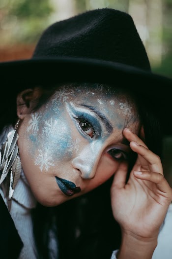 Close-Up Photo of Woman Wearing Fedora Hat