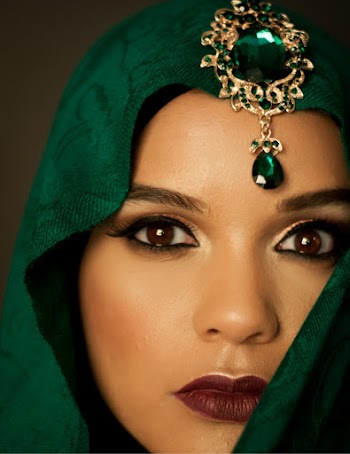 Close-up Photo of Woman Wearing Green Hijab