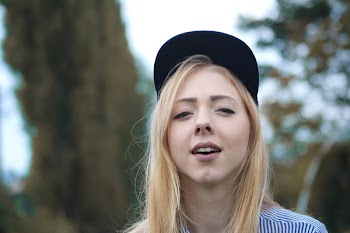 Close-Up Photo of Woman Wearing Hat
