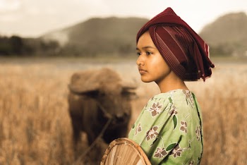 Close-Up Photo of Woman Wearing Headscarf