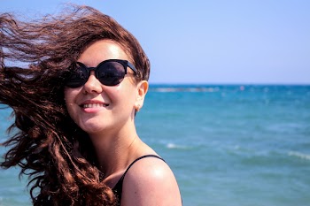 Close-Up Photo of Woman Wearing Sunglasses