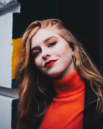 Close-Up Photo of Woman Wearing Turtleneck