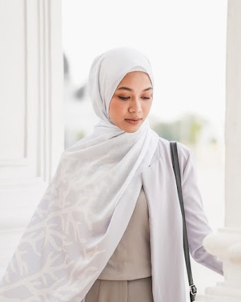 Close-up Photo of Woman Wearing White Hijab