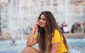 Close-Up Photo of Woman Wearing Yellow Shirt