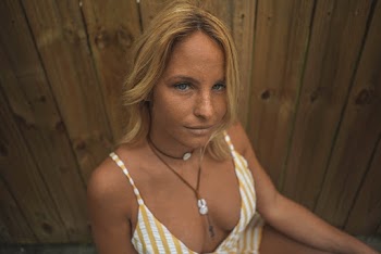 Close-Up Photo of Woman With Blue Eyes