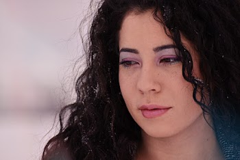 Close-Up Photo of Woman With Curly Hair