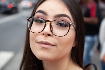 Close Up Photo of Woman with Eyeglasses