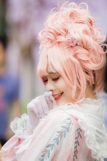 Close-Up Photo Of Woman With Pink Hair 
