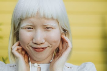 Close-Up Photo of Woman With White Hair