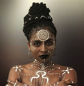 Close-up Photo of Woman With White Tattoo