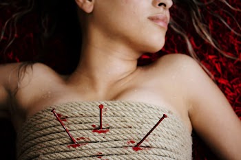 Close-Up Photo of Woman Wrapped With Rope