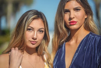Close-Up Photo of Women With Brown Eyes