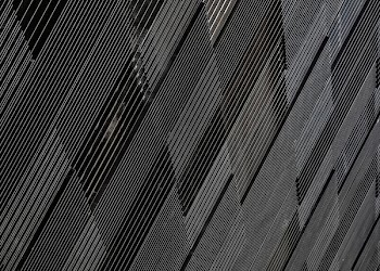 close-up photograph of black concrete wall