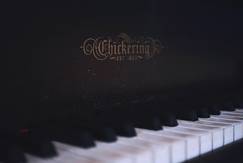 Close-up Photograph of Upright Piano