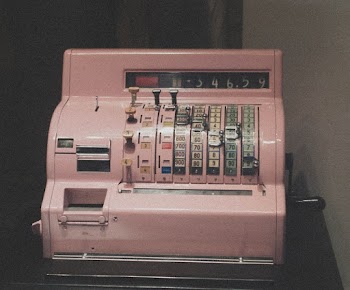 Close-up Photography of a Adding Machine