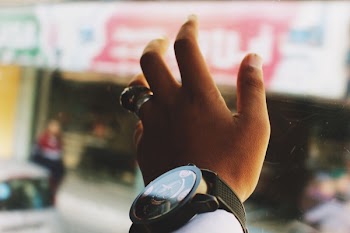 Close-Up Photography of a Hand Near Glass