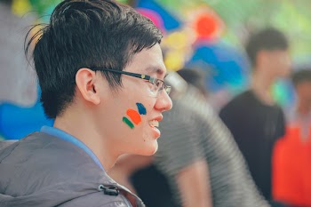 Close-Up Photography of a Man With Paint on Face