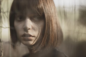 Close-Up Photography Of A Woman's Face