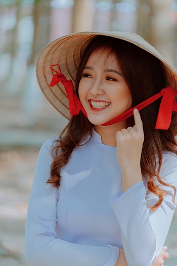 Close-Up Photography of a Woman Wearing Straw Hat