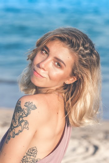 Close-Up Photography of a Woman With Tattoo