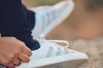 Close-Up Photography of Adidas Shoe