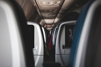 close-up photography of airplane chairs