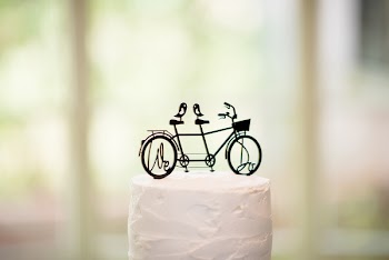 Close-up Photography of Black Tandem Bicycle Scale Model