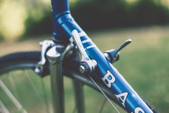 Close-up Photography Of Blue Bicycle Frame