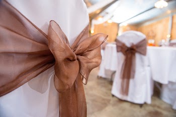Close Up Photography Of Chair With Bow